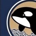 炭火処 シャチのロゴ